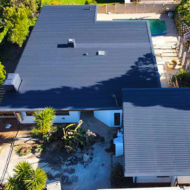 Waterproofing on IBR roof by Eco Rubber Cape